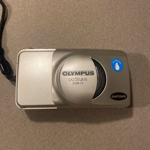 Olympus stylus zoom 115 quartz date, camera with box and all of paperwork. Rare